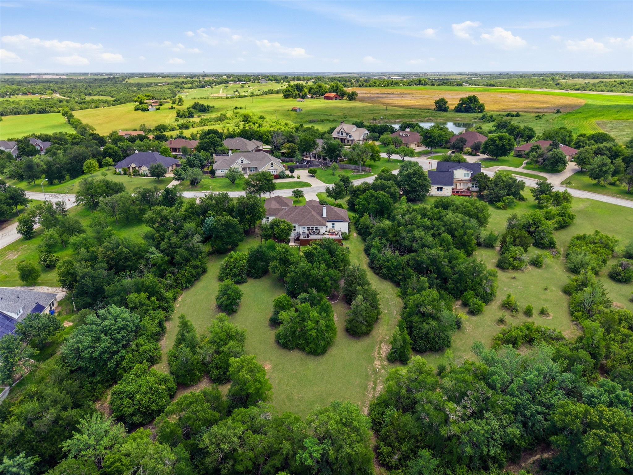 1804 Tanner Loop Taylor, TX 76574 - Photo 2 of 40 The home is set on a sprawling .761-acre lot.