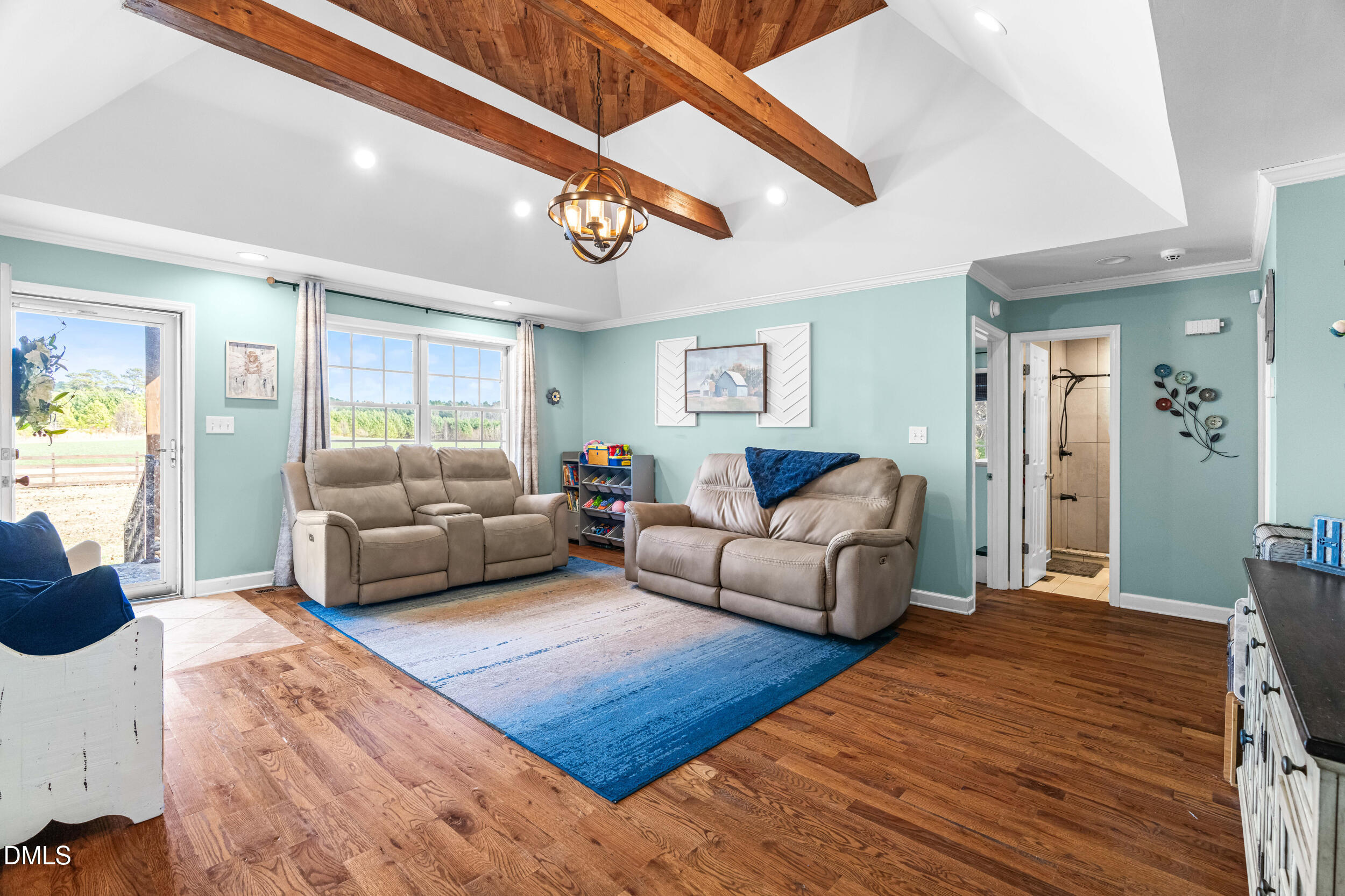 855 Debro Road Kenly, NC 27542 - Photo 11 of 41 a living room with furniture and a large window