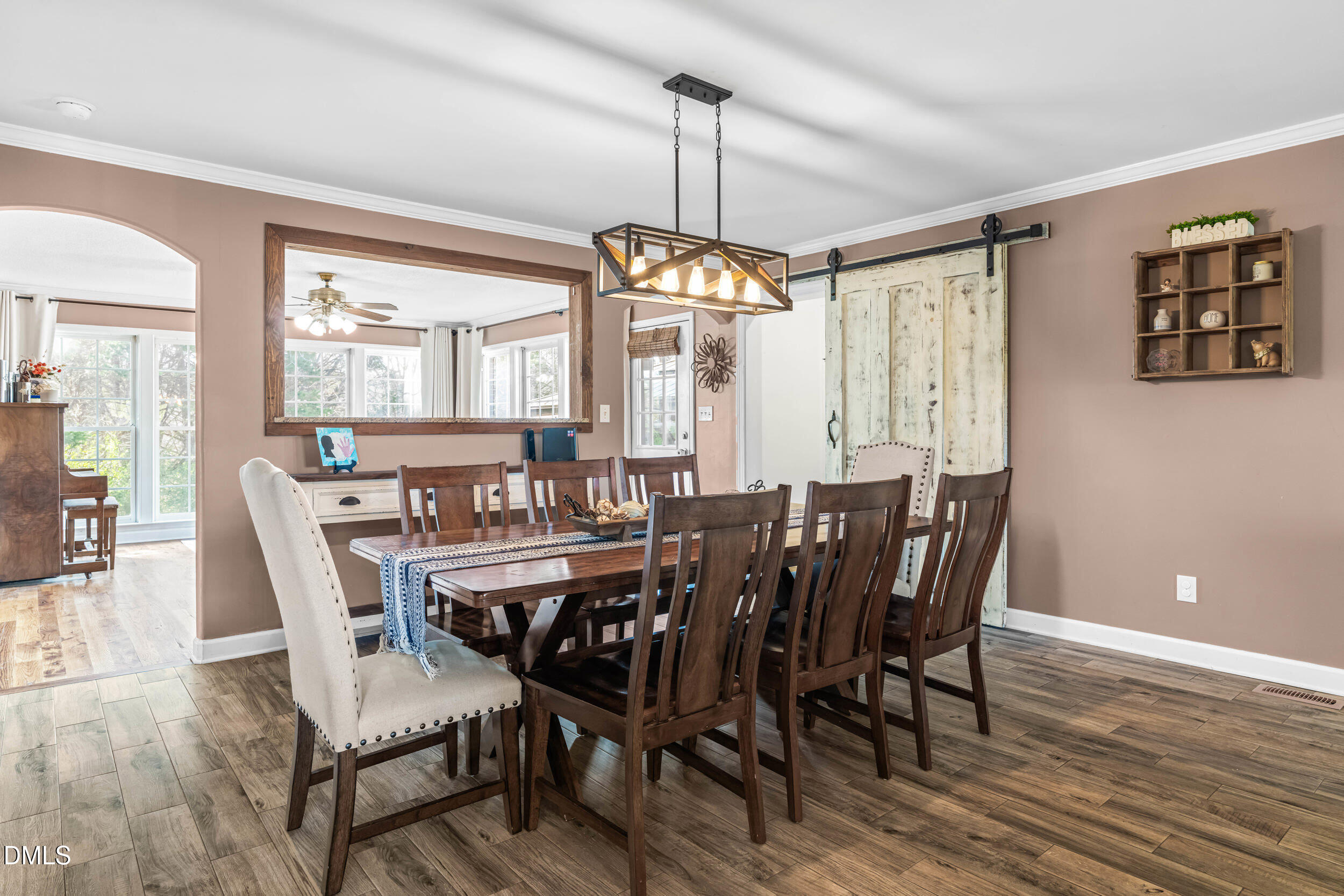 855 Debro Road Kenly, NC 27542 - Photo 18 of 41 a view of a dining room with furniture window and wooden floor