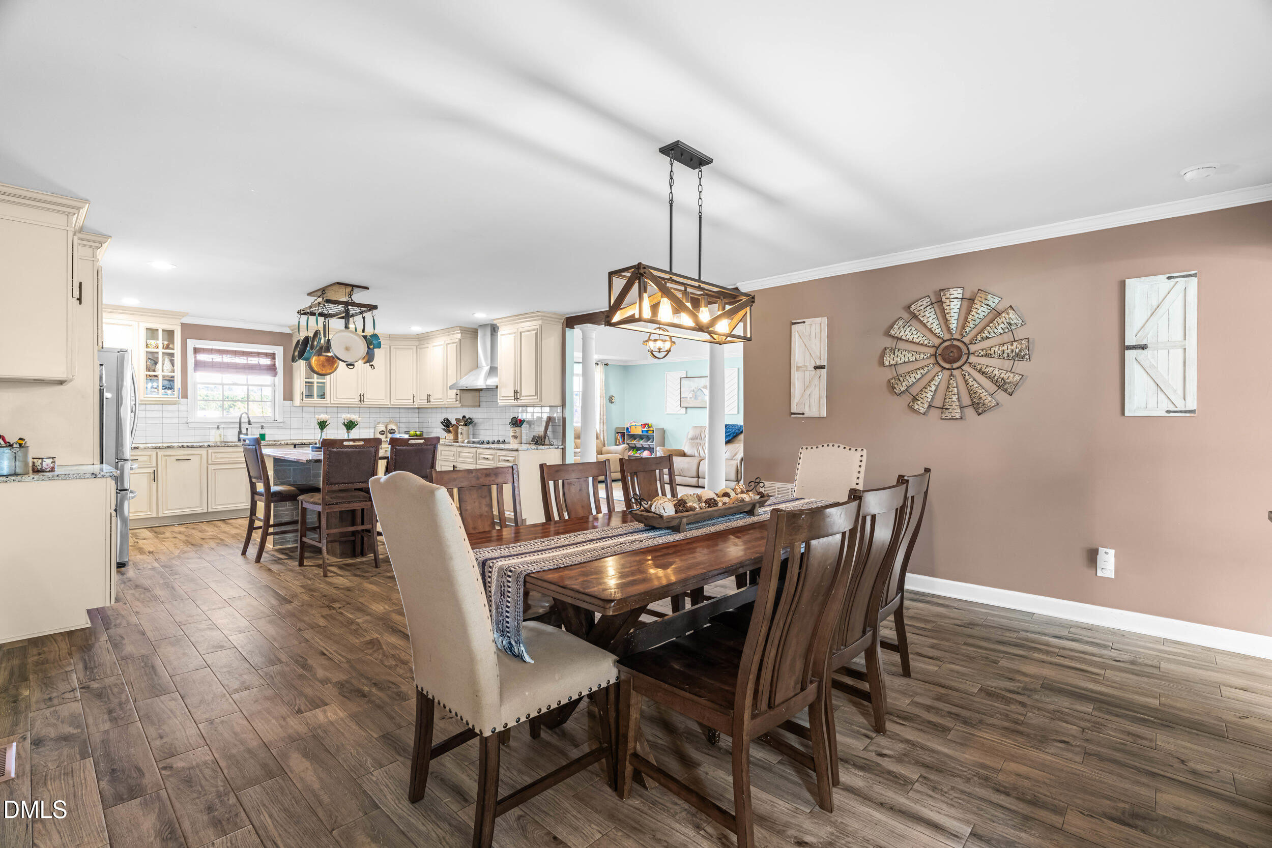855 Debro Road Kenly, NC 27542 - Photo 19 of 41 a view of a dining room with furniture and wooden floor