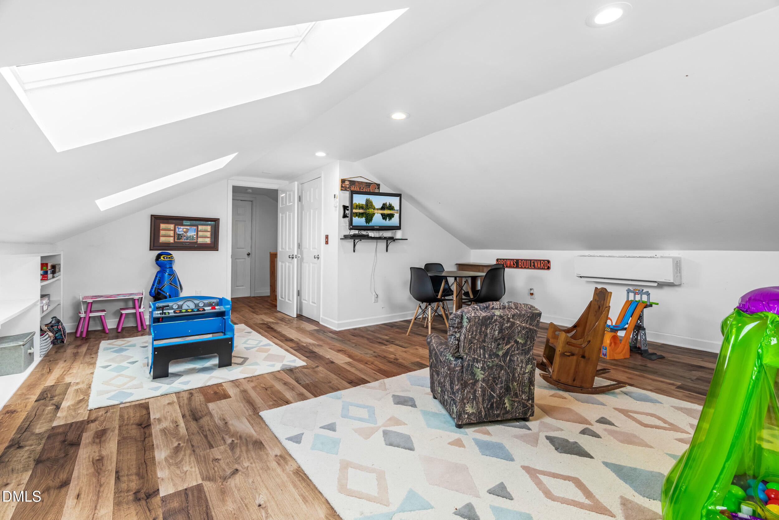 855 Debro Road Kenly, NC 27542 - Photo 32 of 41 a living room with furniture and wooden floor