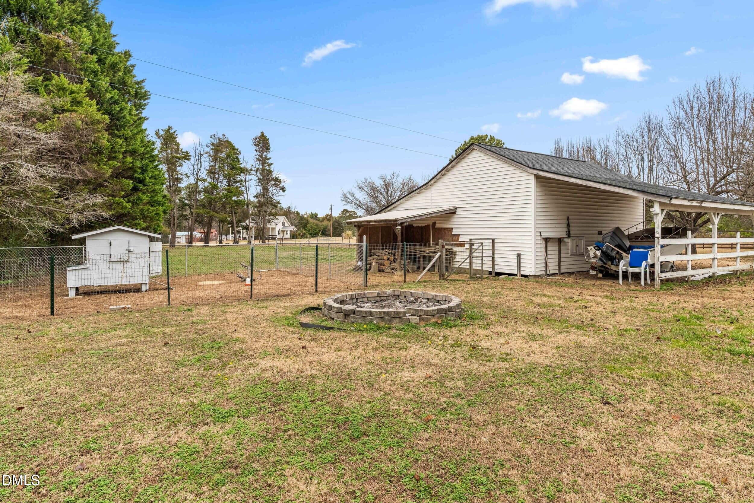 855 Debro Road Kenly, NC 27542 - Photo 39 of 41 a view of a house with a outdoor space