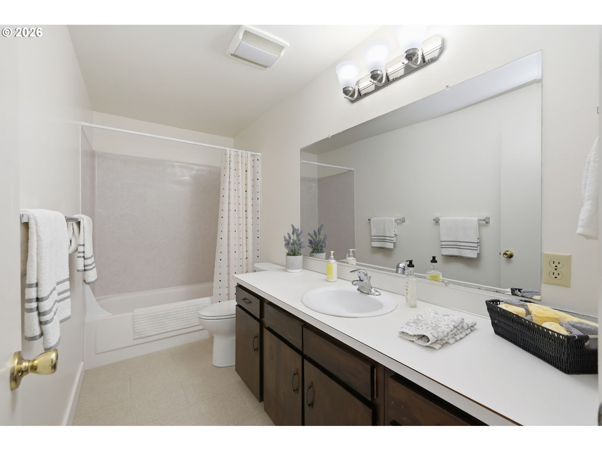 1674 Hayes Street, Unit B Eugene, OR 97402 - Photo 21 of 30 a bathroom with a sink double vanity granite tub shower and a mirror