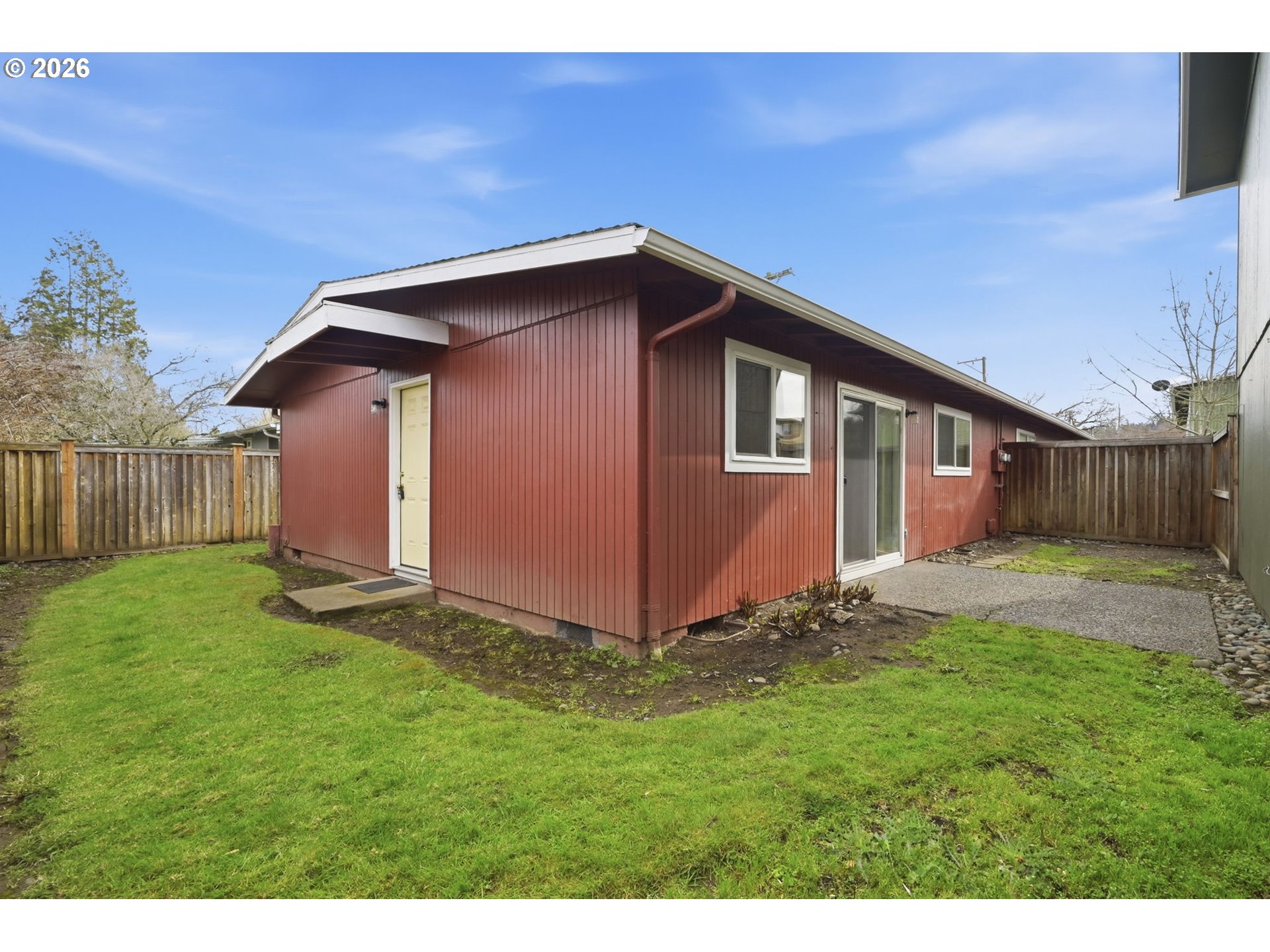 1674 Hayes Street, Unit B Eugene, OR 97402 - Photo 25 of 30 a view of backyard with wooden fence