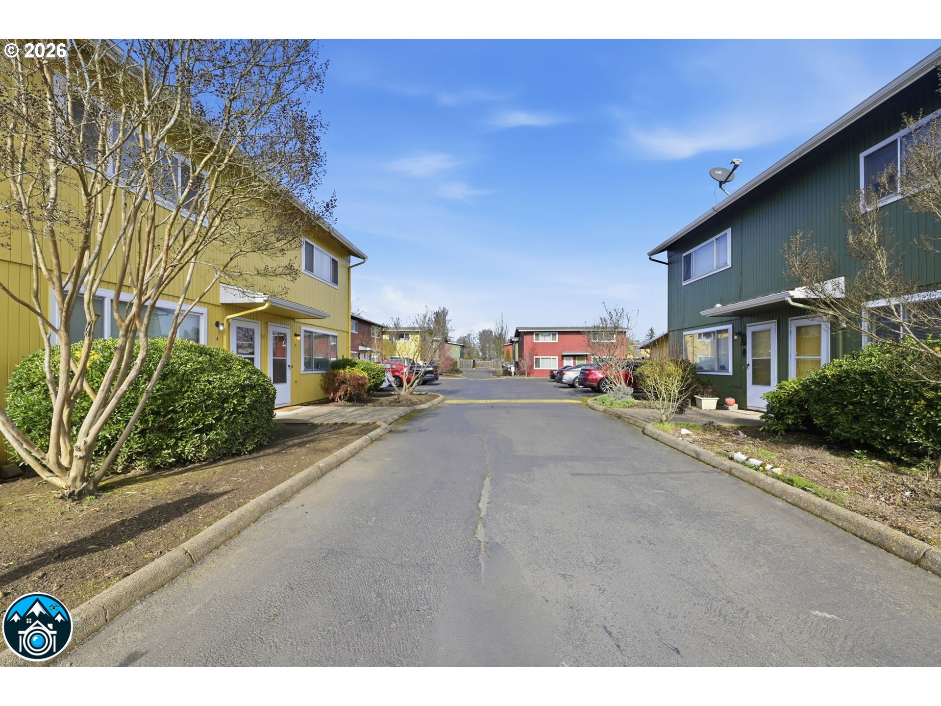 1674 Hayes Street, Unit B Eugene, OR 97402 - Photo 29 of 30 a city street lined with buildings and cars