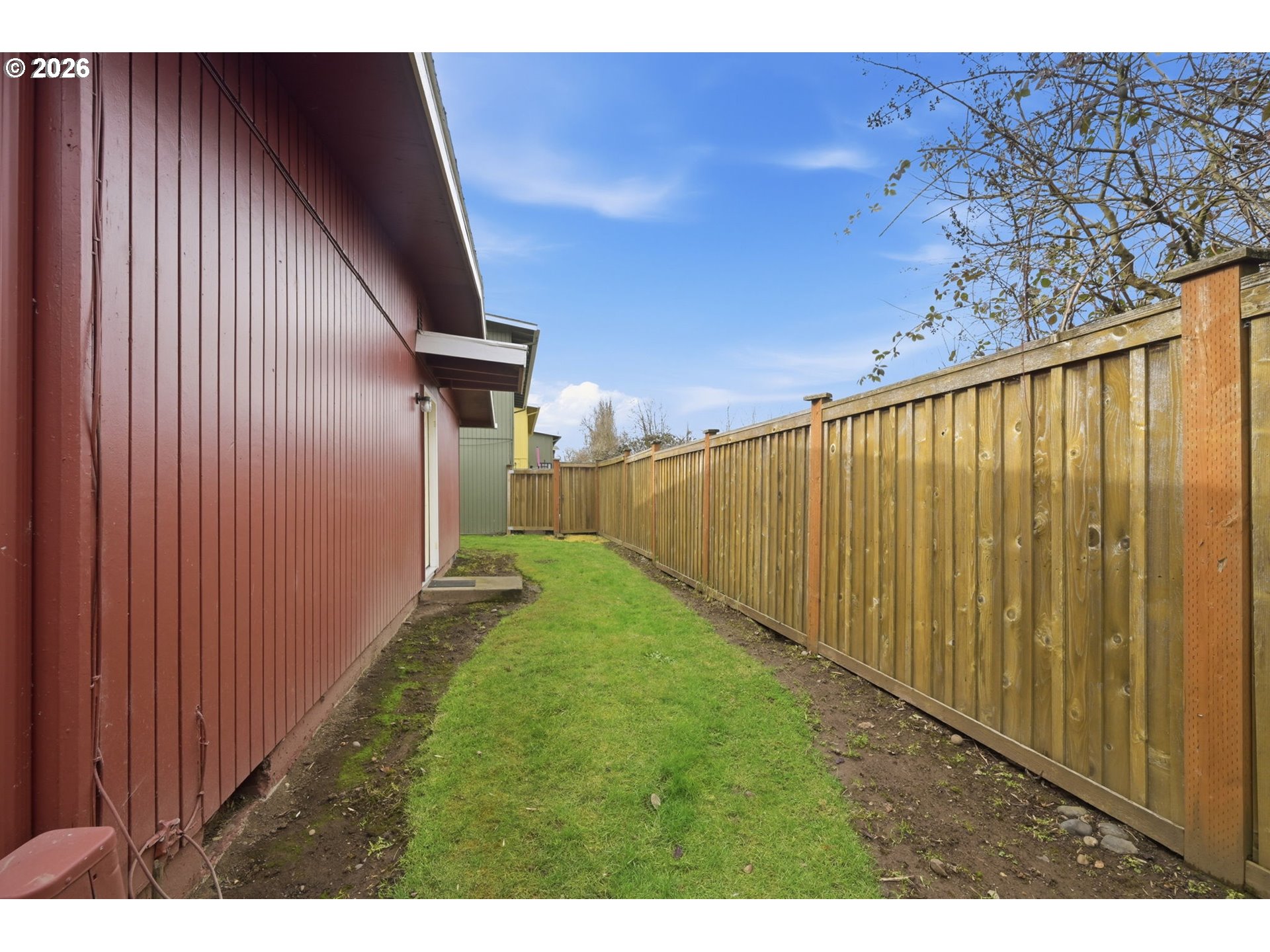 1674 Hayes Street, Unit B Eugene, OR 97402 - Photo 4 of 30 a view of a backyard with pathway