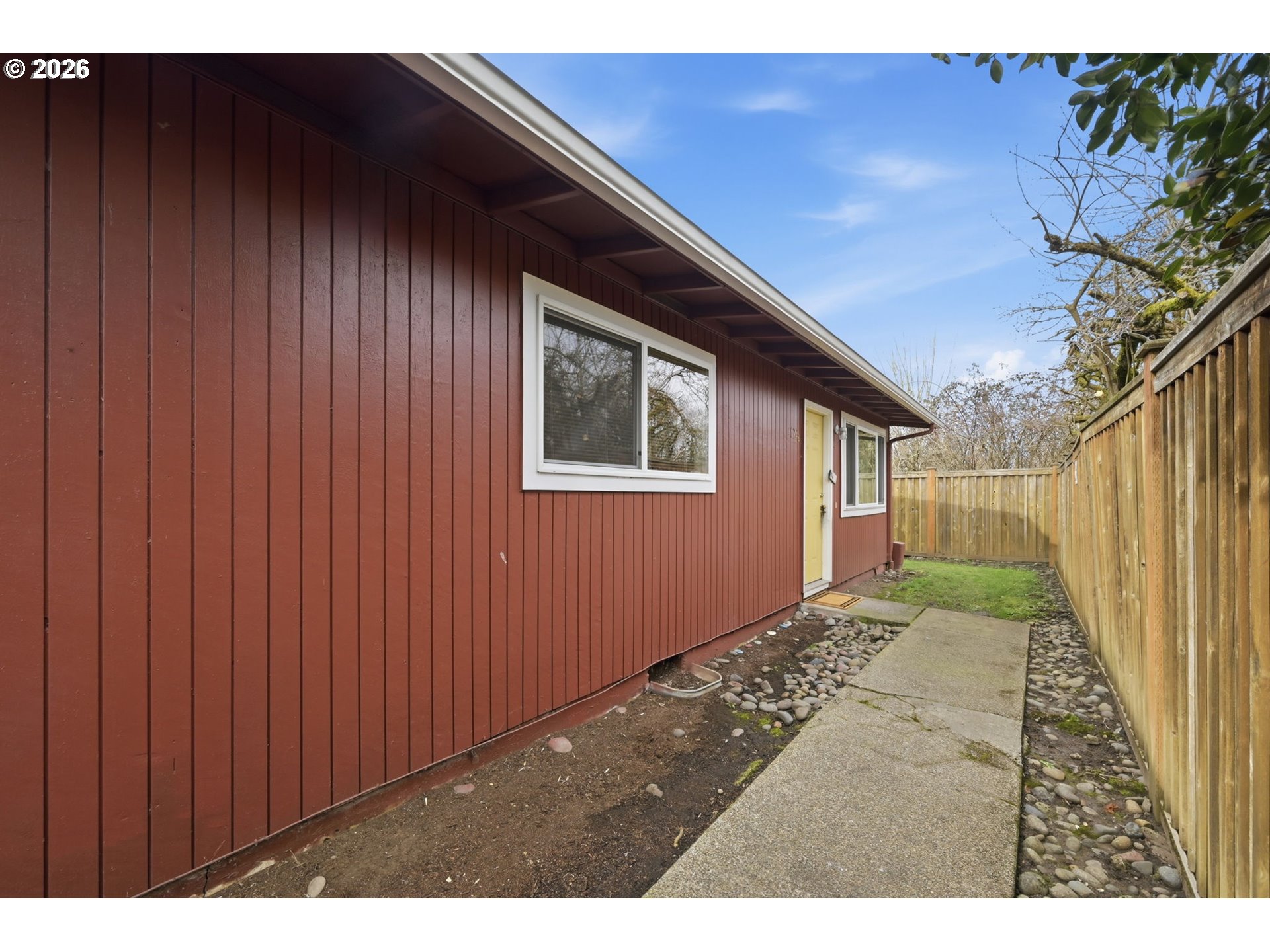 1674 Hayes Street, Unit B Eugene, OR 97402 - Photo 5 of 30 a view of backyard with garage