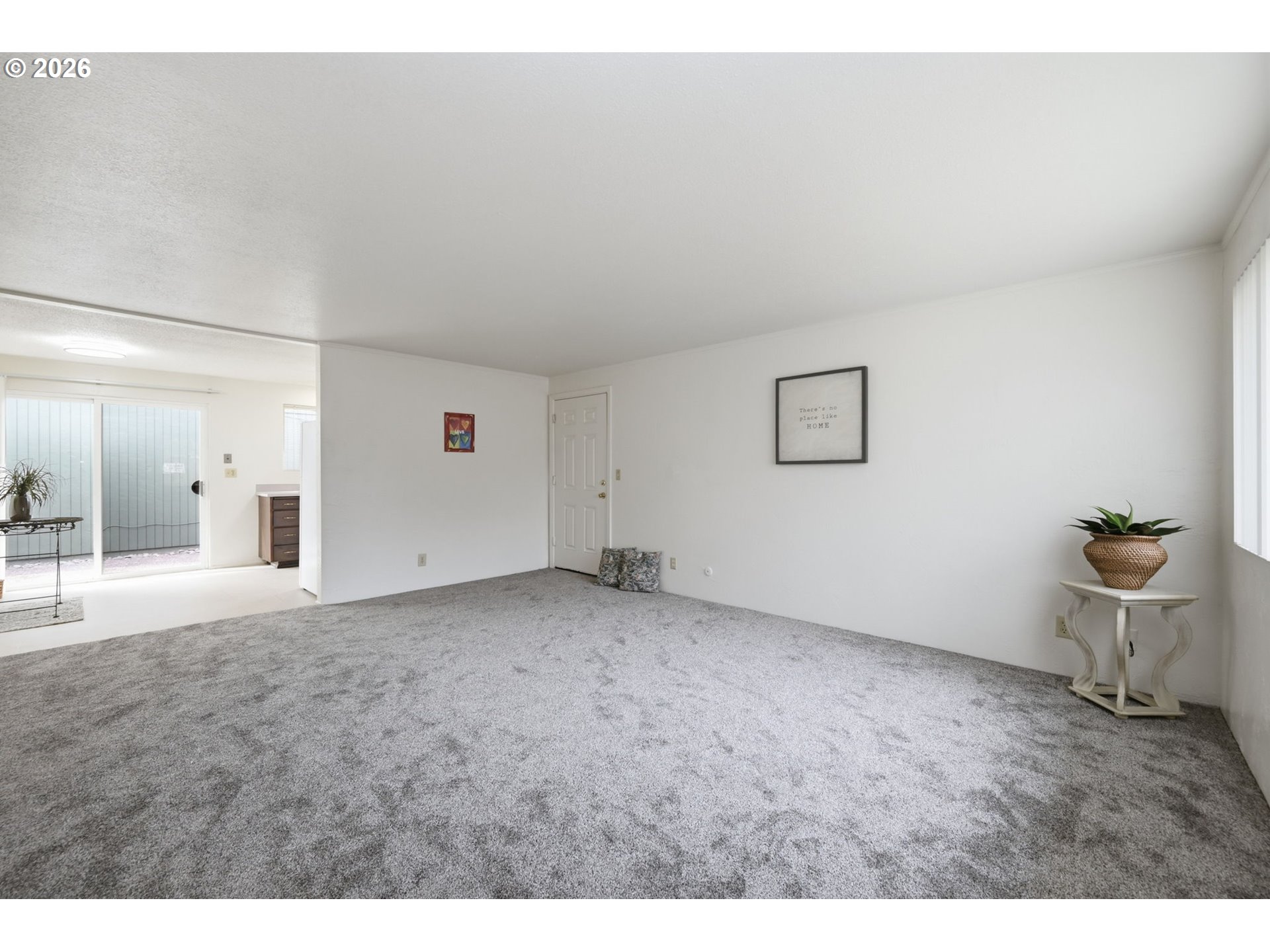 1674 Hayes Street, Unit B Eugene, OR 97402 - Photo 6 of 30 a view of an empty room and a window