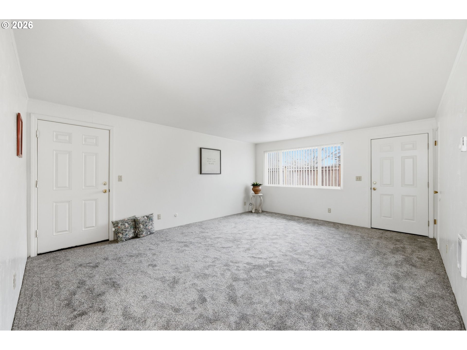 1674 Hayes Street, Unit B Eugene, OR 97402 - Photo 8 of 30 a view of empty room with windows