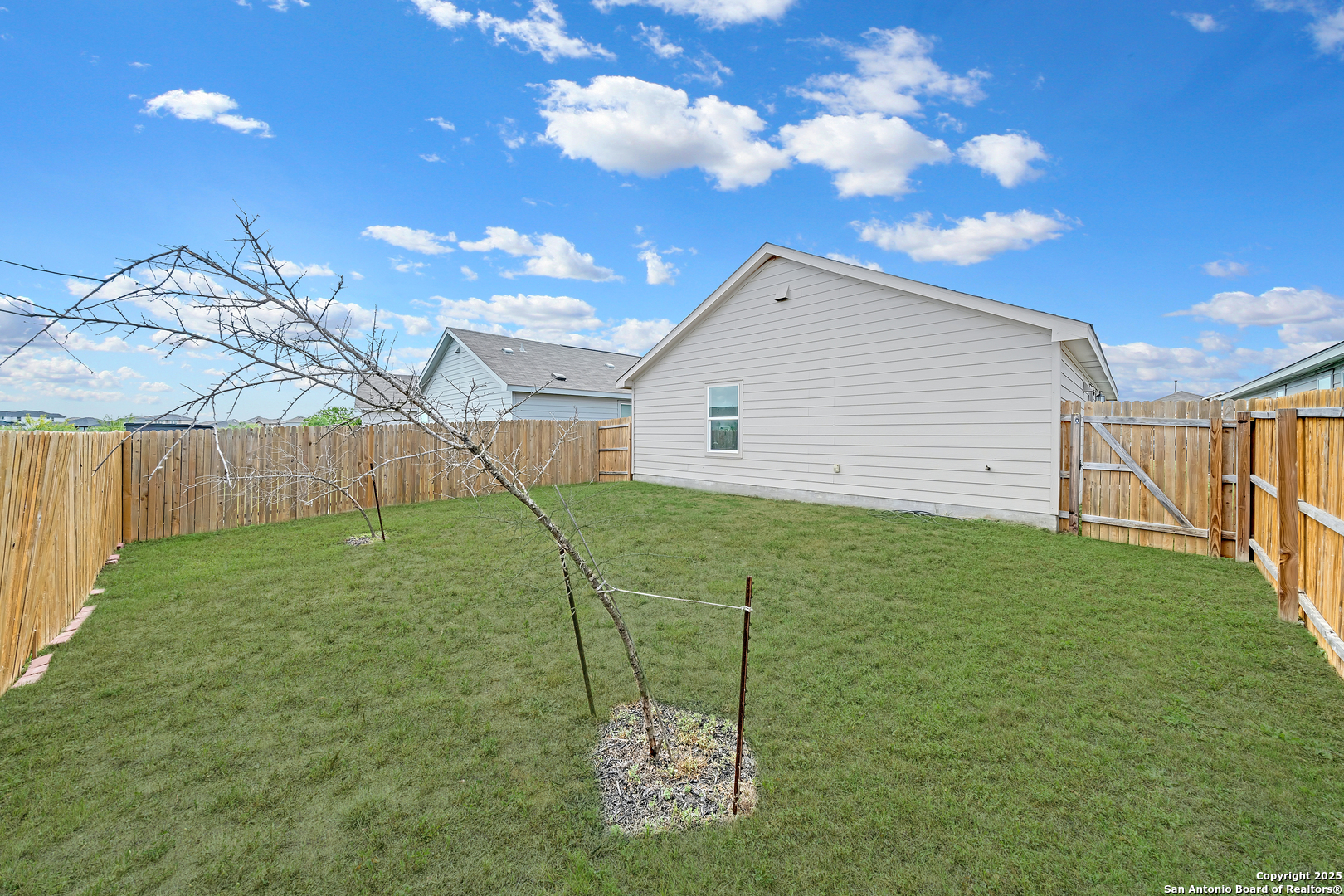 242 Ambush Ridge San Antonio, TX 78220 - Photo 14 of 15 a view of a backyard
