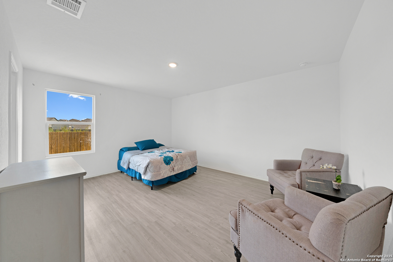 242 Ambush Ridge San Antonio, TX 78220 - Photo 9 of 15 a living room with furniture and a window