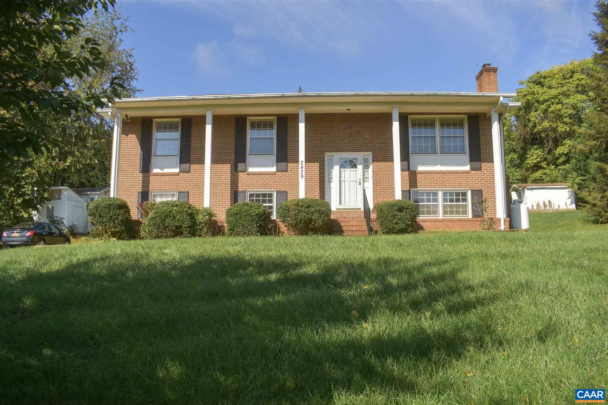 2429 Huntington Road Charlottesville, VA 22901 - Photo 1 of 32 a view of a house with backyard and garden