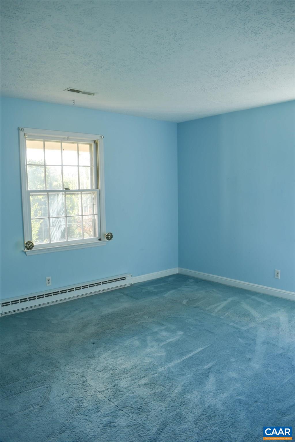 2429 Huntington Road Charlottesville, VA 22901 - Photo 16 of 32 an empty room with a window