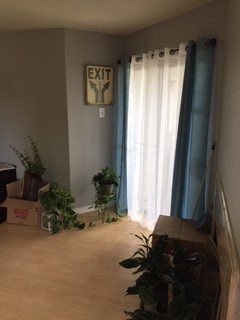8787 Brae Acres Road, Unit 403 Houston, TX 77074 - Photo 2 of 7 a bed room with furniture and a window