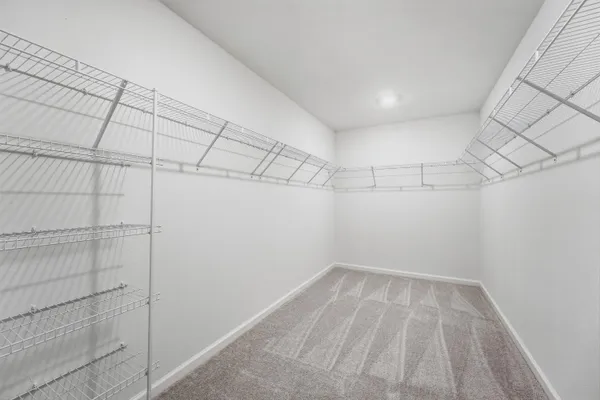 a view of a room with racks on the wall