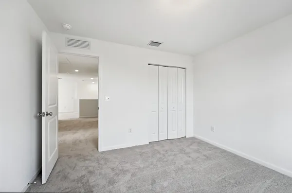 an empty room with a natural light