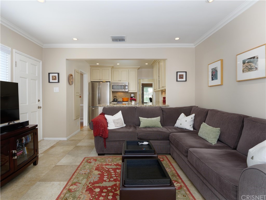 1122 North Niagara Street Burbank, CA 91505 - Photo 18 of 39 a living room with furniture and a flat screen tv