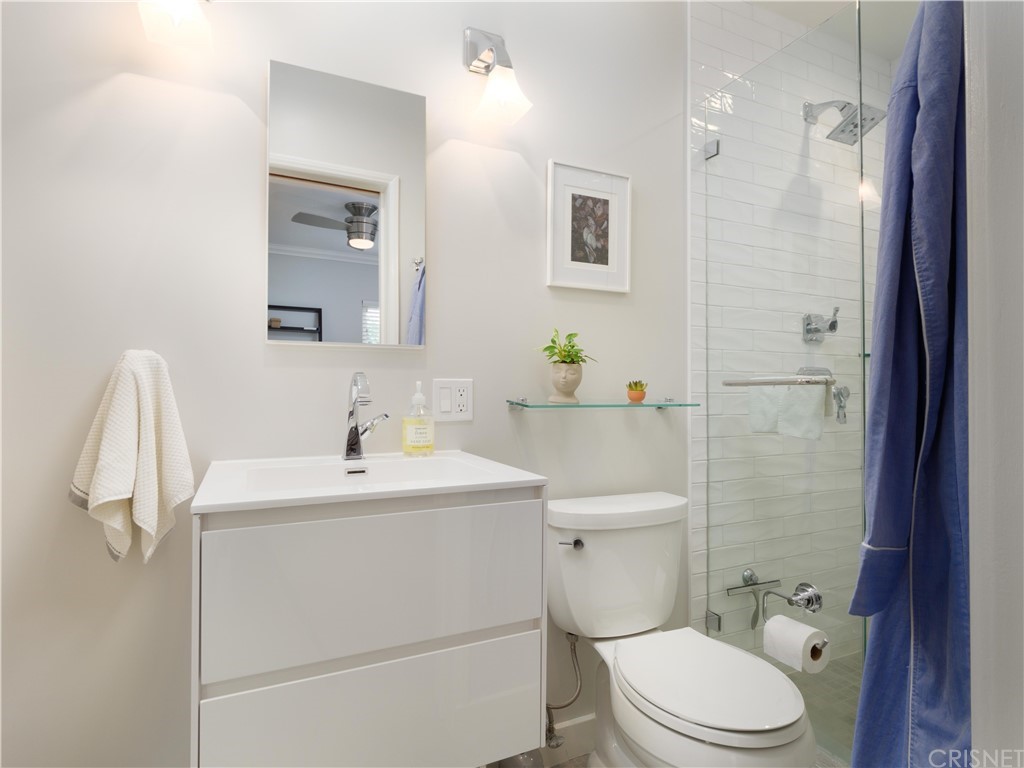 1122 North Niagara Street Burbank, CA 91505 - Photo 25 of 39 a bathroom with a sink toilet and shower