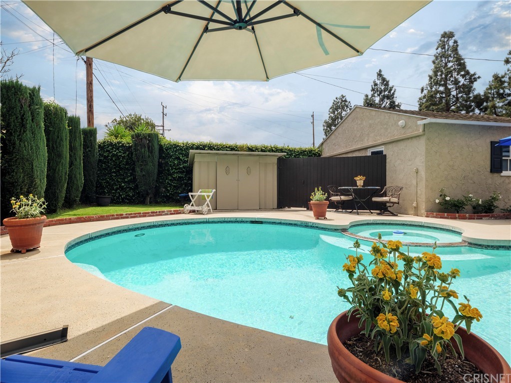 1122 North Niagara Street Burbank, CA 91505 - Photo 33 of 39 a view of a swimming pool with a patio