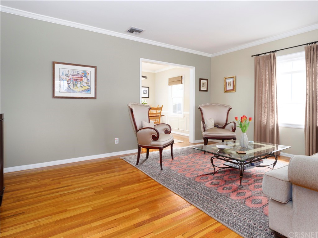 1122 North Niagara Street Burbank, CA 91505 - Photo 4 of 39 a living room with furniture rug and window
