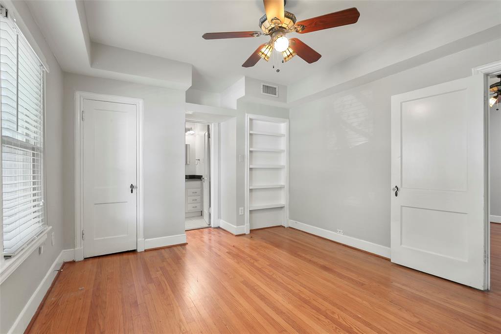 6166 Oram Street Dallas, TX 75214 - Photo 22 of 25 wooden floor in an empty room with a window