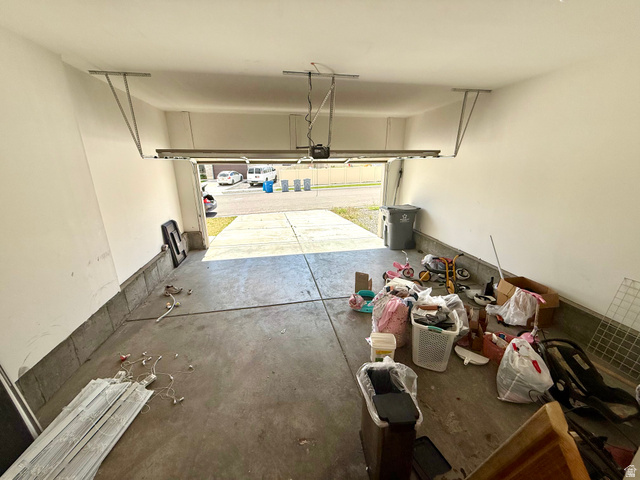 1823 South Longview Road Santaquin, UT 84655 - Photo 25 of 69 Attached two-car garage featuring a concrete floor and painted interior walls