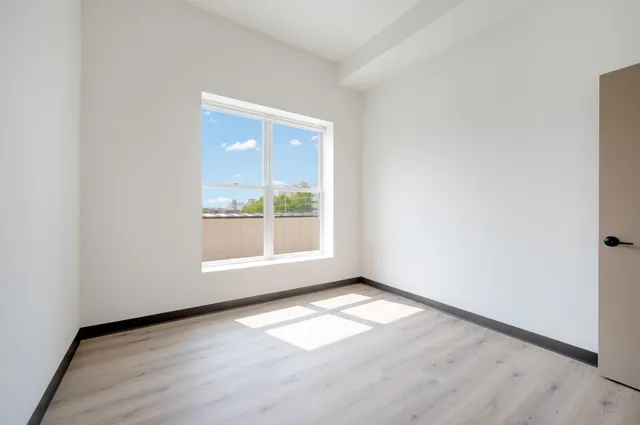 a view of a building and a street