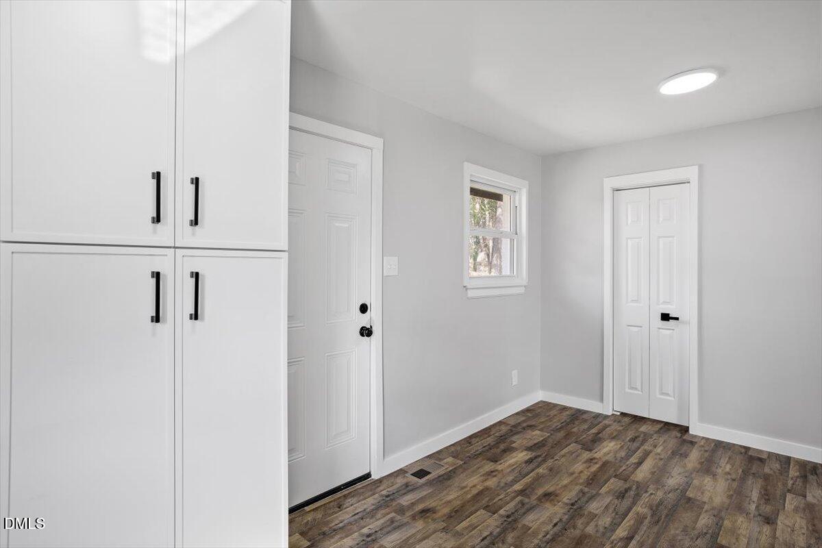 1905 Capps Street Durham, NC 27707 - Photo 15 of 35 a view of hallway with wooden floor