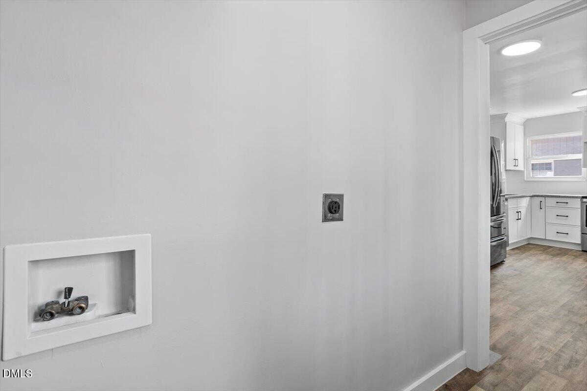 1905 Capps Street Durham, NC 27707 - Photo 18 of 35 a view of a hallway with closet