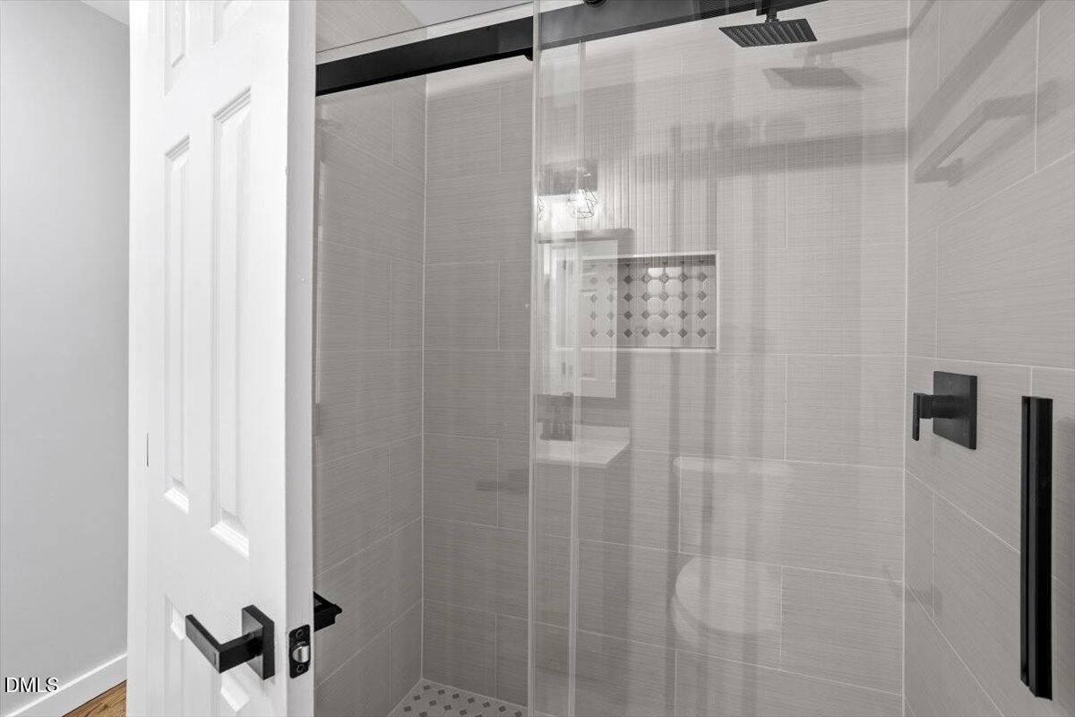 1905 Capps Street Durham, NC 27707 - Photo 25 of 35 a bathroom with a shower