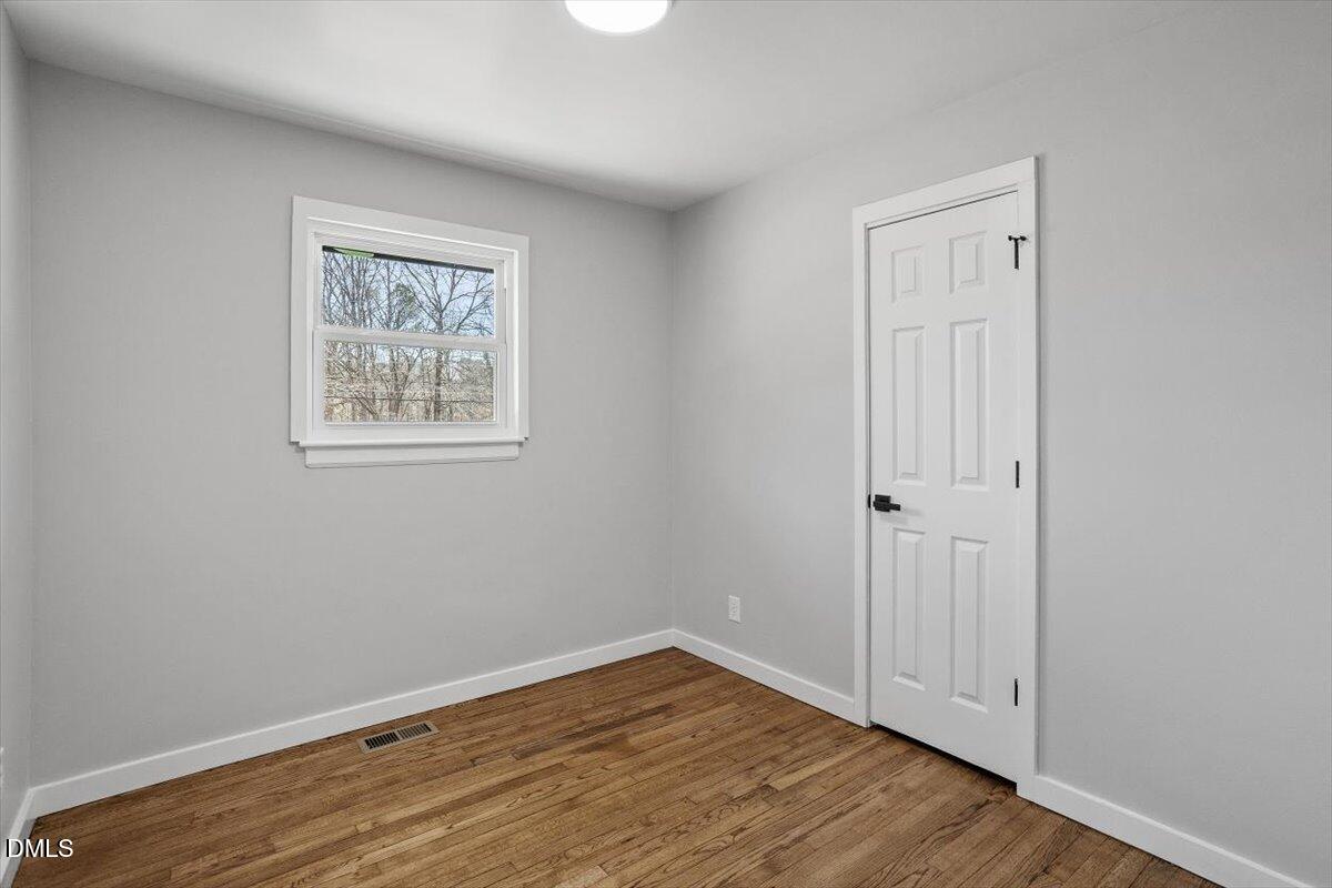 1905 Capps Street Durham, NC 27707 - Photo 26 of 35 wooden floor in an empty room