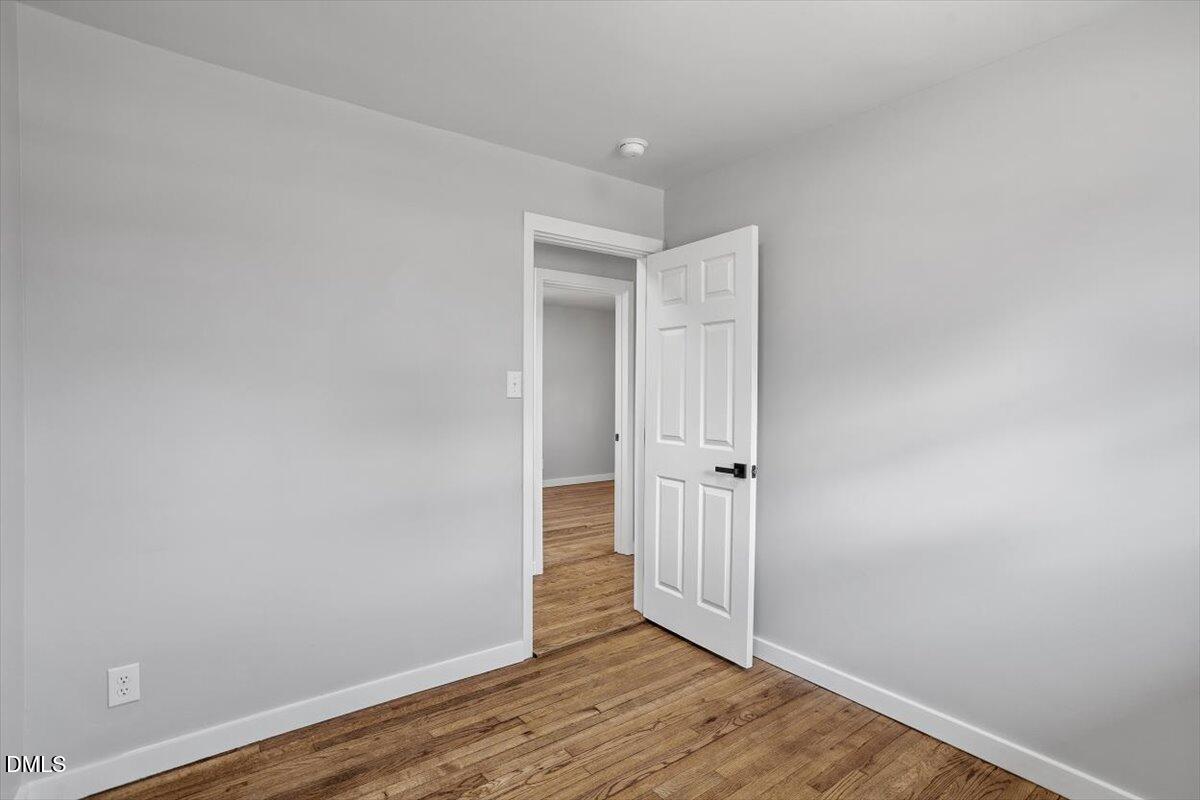 1905 Capps Street Durham, NC 27707 - Photo 27 of 35 a view of a hallway with wooden floor