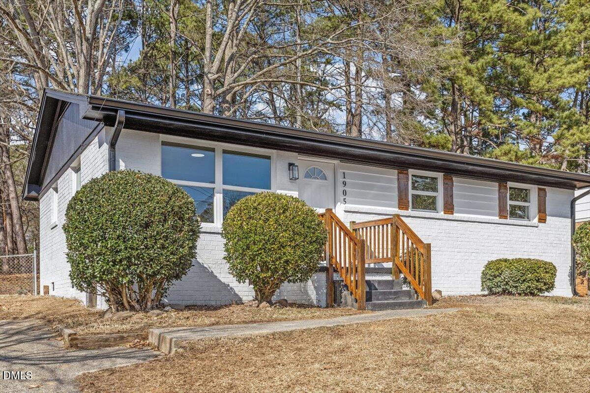 1905 Capps Street Durham, NC 27707 - Photo 2 of 35 a view of a house with a small yard