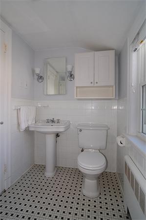 1 Alba Road Wellesley, MA 02481 - Photo 15 of 18 a bathroom with a sink toilet and a mirror