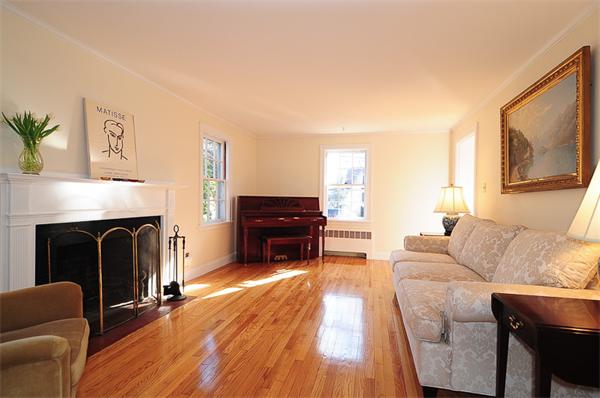 1 Alba Road Wellesley, MA 02481 - Photo 2 of 18 a living room with furniture and a fireplace