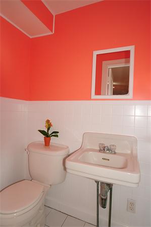 1 Alba Road Wellesley, MA 02481 - Photo 8 of 18 a bathroom with a sink a toilet and mirror