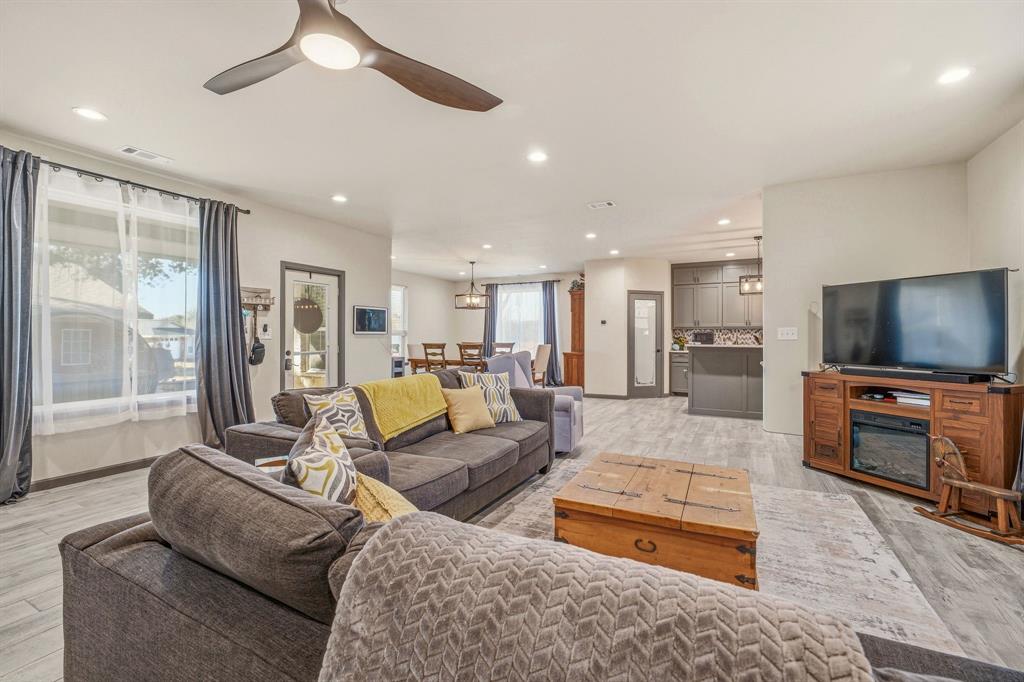 435 Edwards Drive Dublin, TX 76446 - Photo 6 of 40 a living room with furniture and a flat screen tv