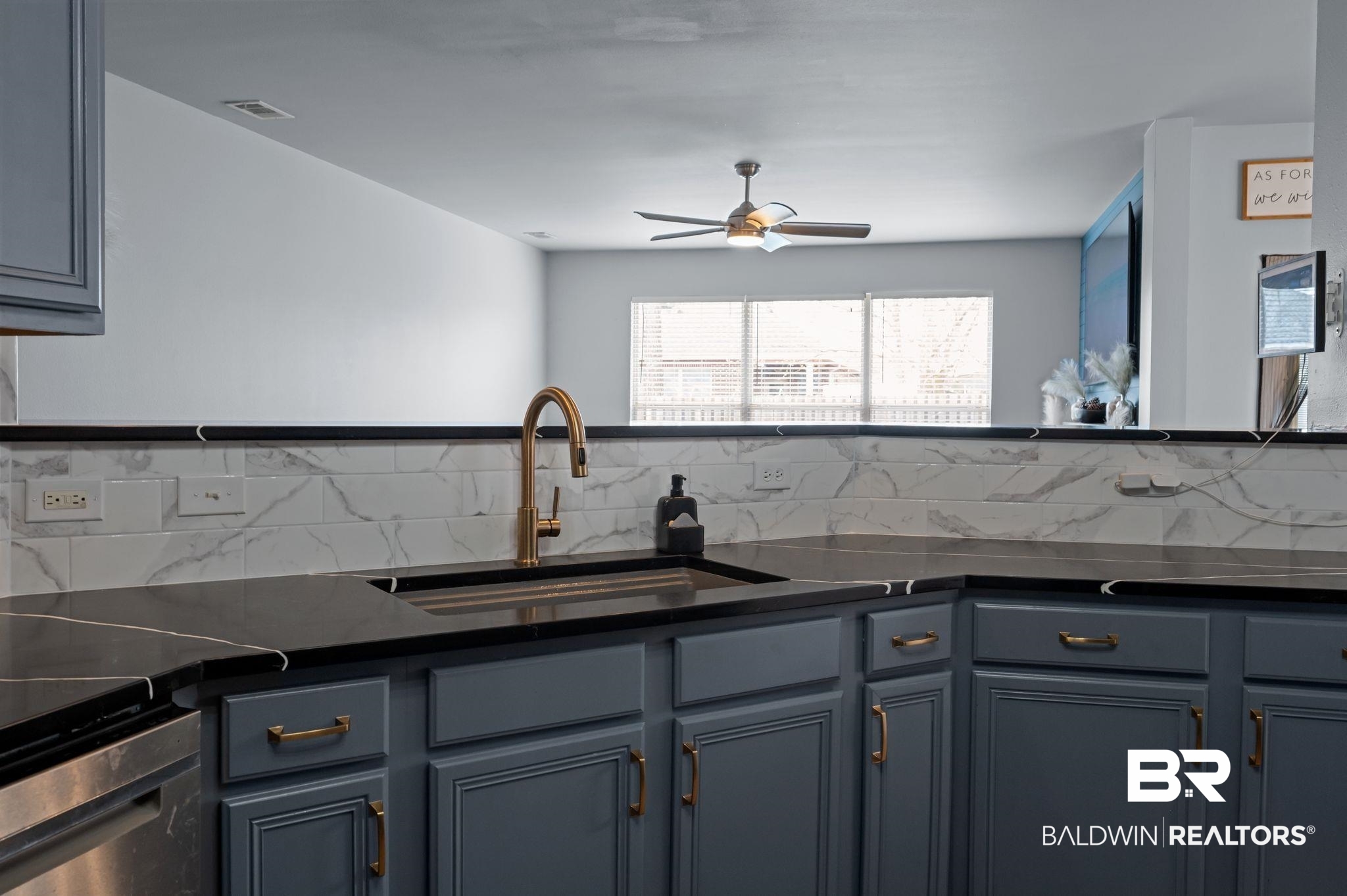 1287 Pembroke Way Foley, AL 36535 - Photo 17 of 39 Kitchen featuring dark stone countertops, backsplash, ceiling fan, and stainless steel range
