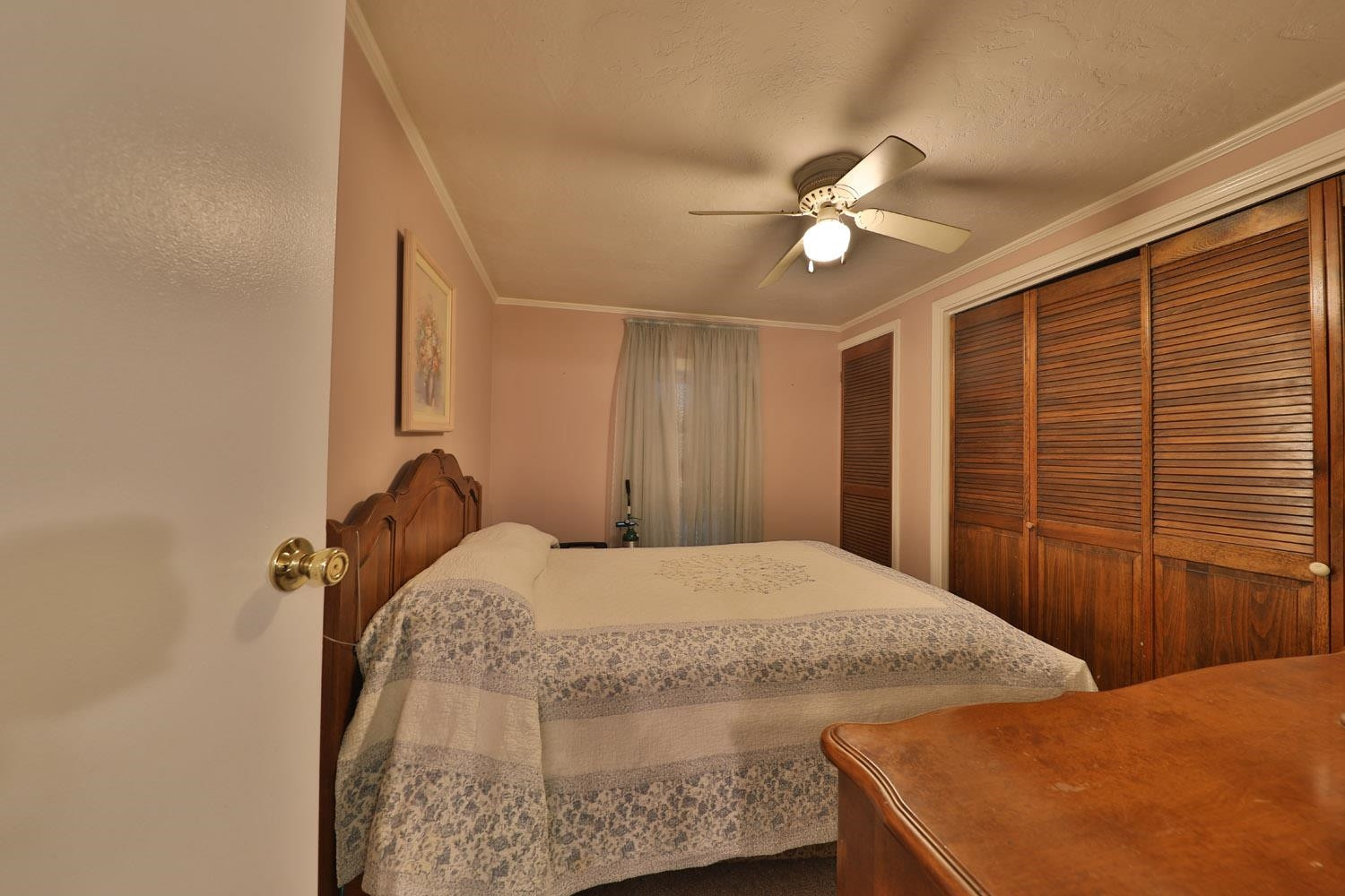 232 Matheny Grove Road Dresden, TN 38225 - Photo 10 of 21 a bedroom with a bed and a chandelier