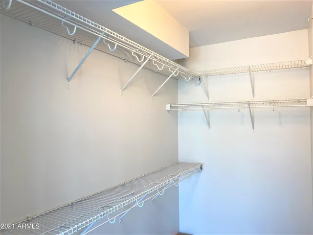 a view of a room with racks on the wall