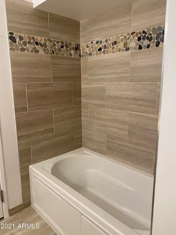 a bathroom with a bathtub