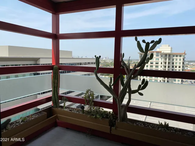 a view of outdoor living room with furniture and window