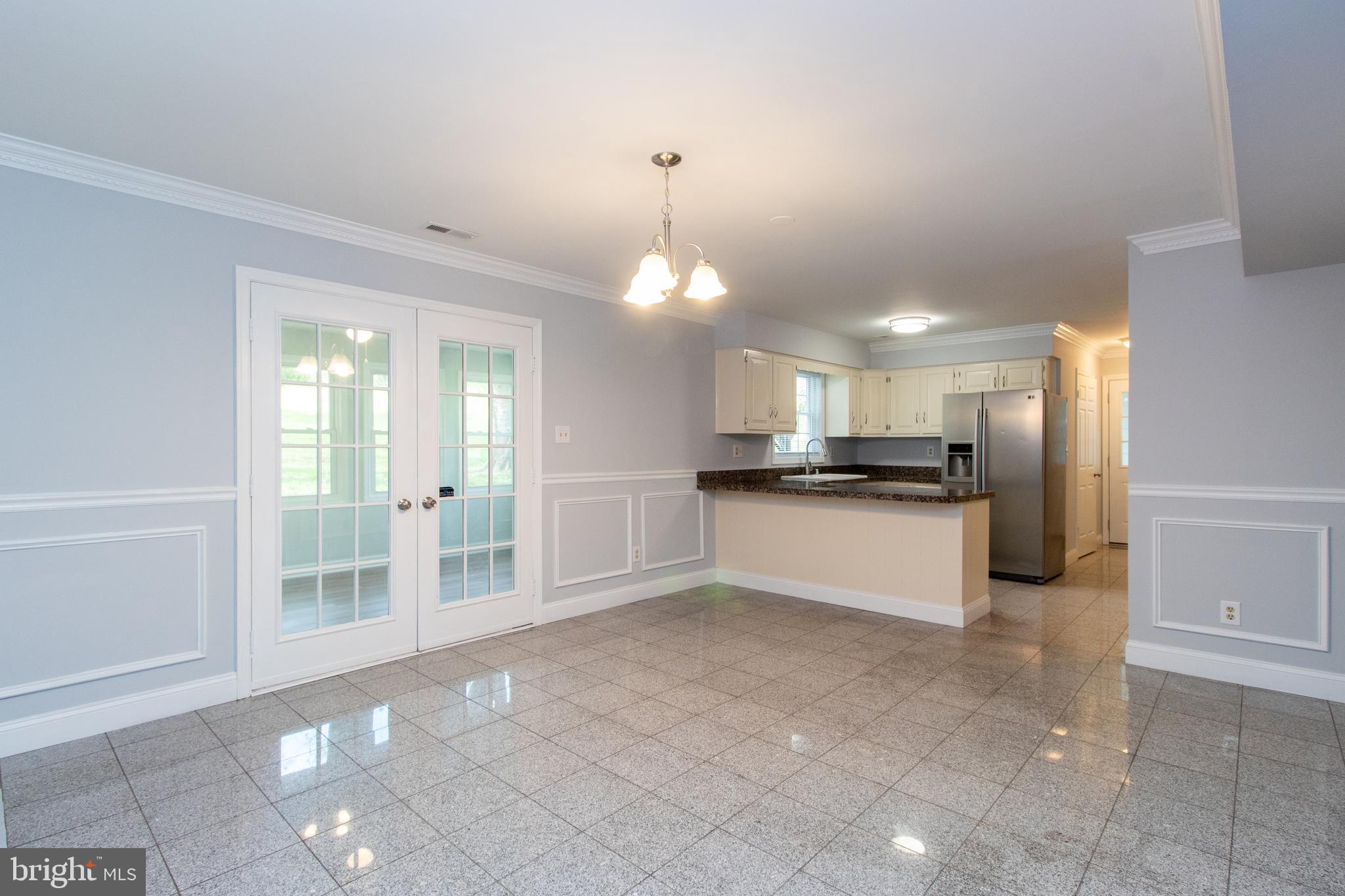 12020 Cross Rd Trail Brandywine, MD 20613 - Photo 11 of 29 Living Room and Kitchen