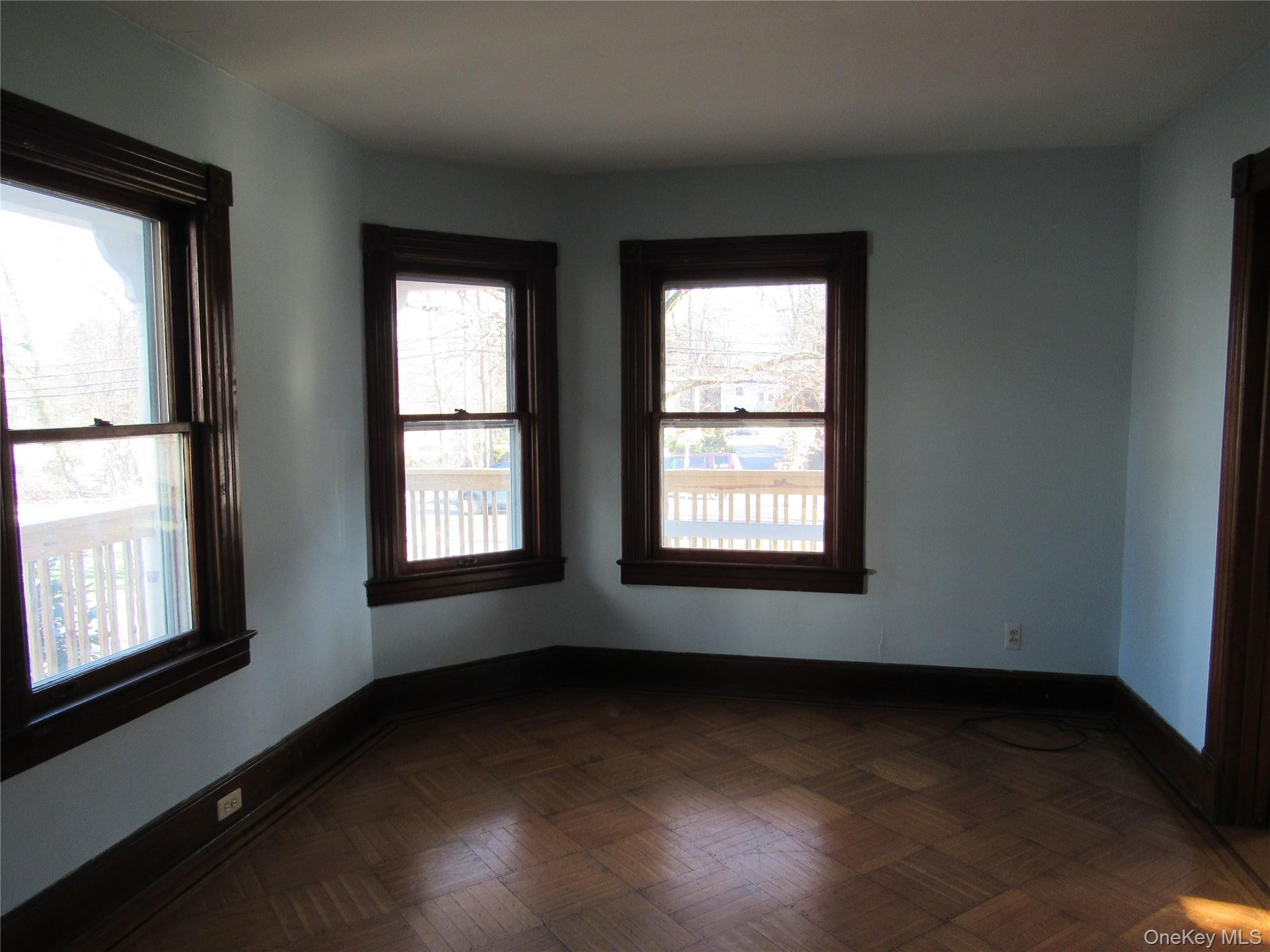 98 Main Street Chester, NY 10918 - Photo 11 of 32 Living room featuring baseboards