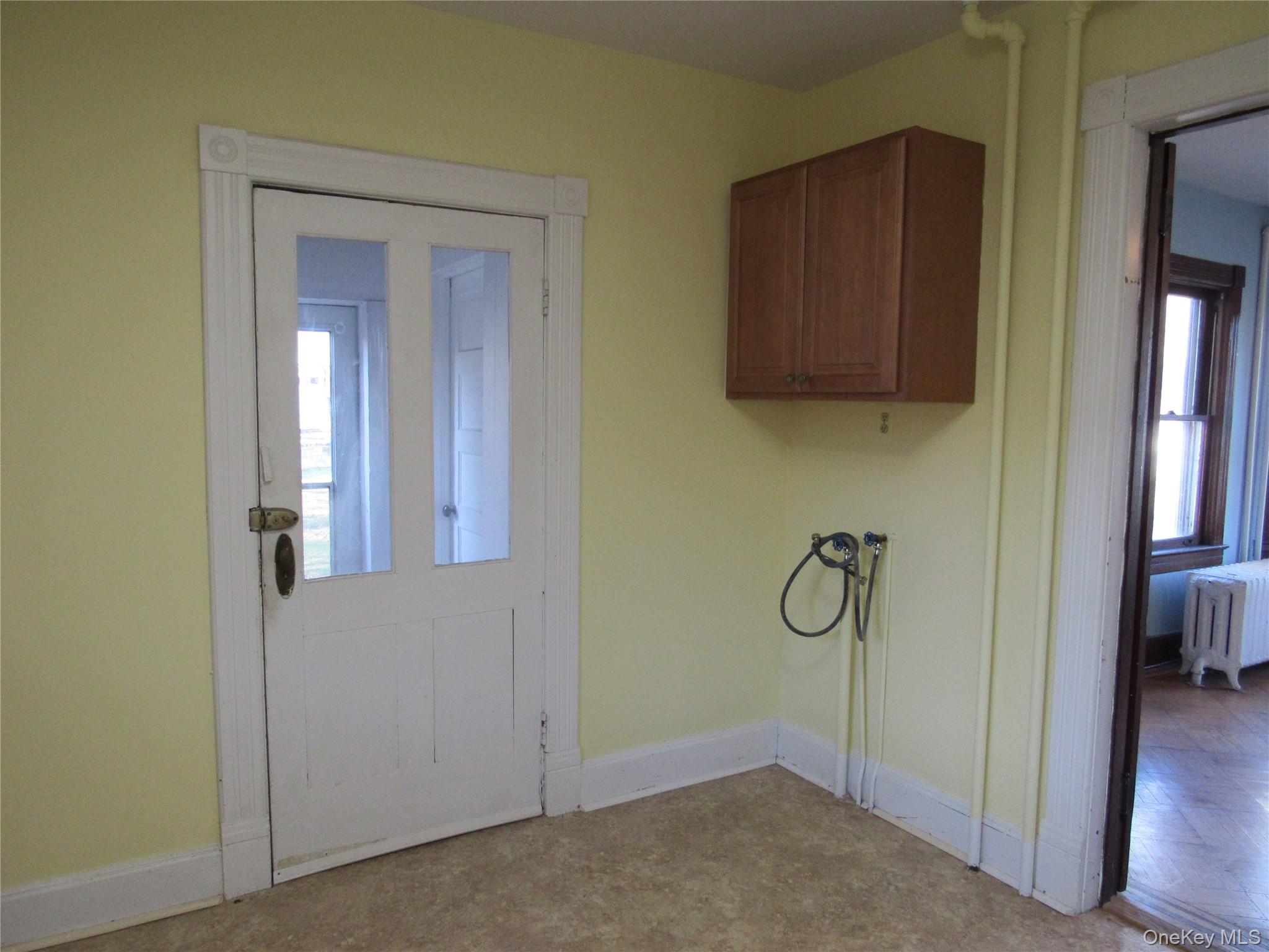 98 Main Street Chester, NY 10918 - Photo 17 of 32 Washer hookup in the Kitchen. Dryer hookup through door to enclosed back porch.