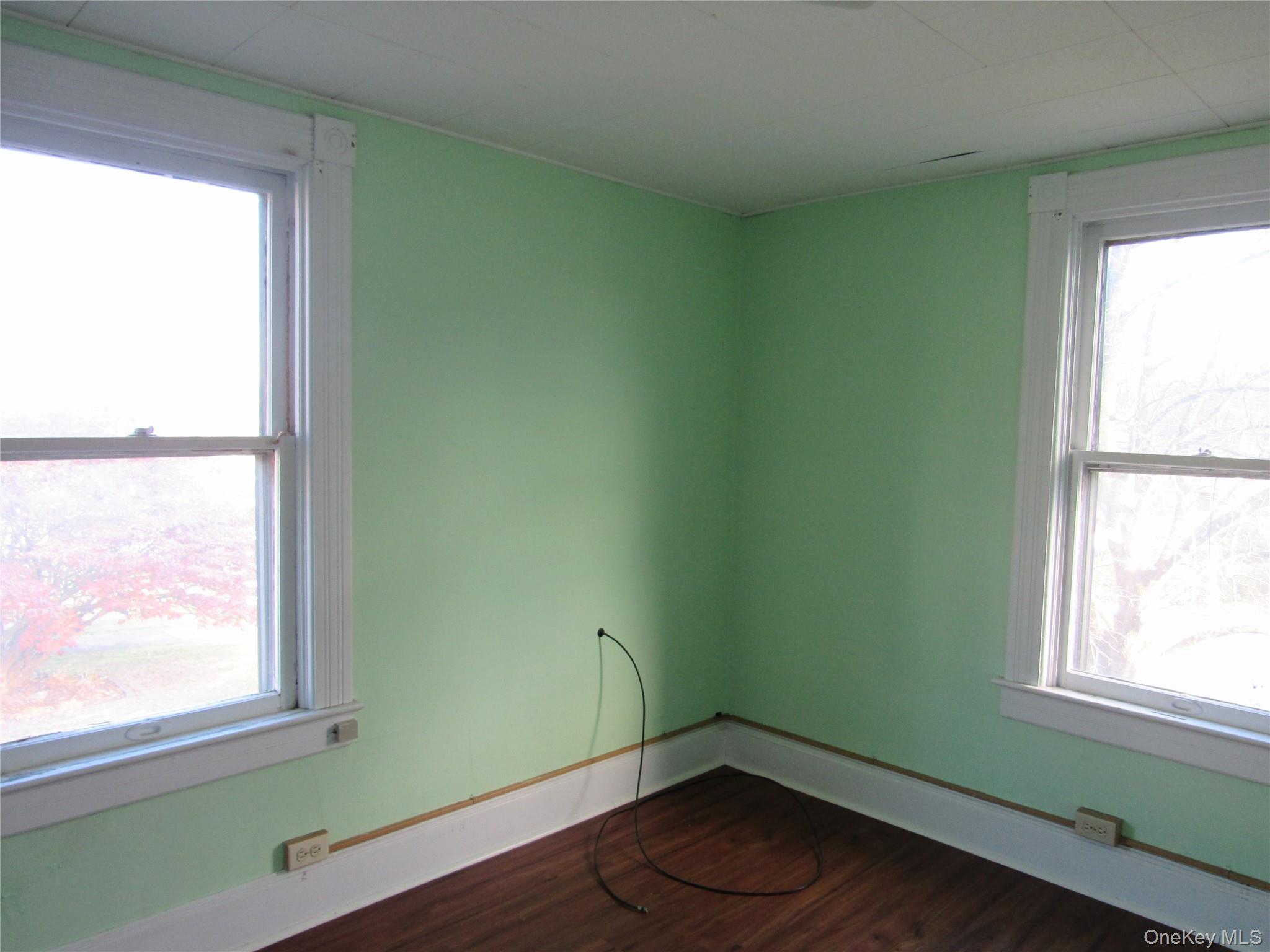 98 Main Street Chester, NY 10918 - Photo 20 of 32 Bedroom #2 featuring dark wood finished floors and baseboards