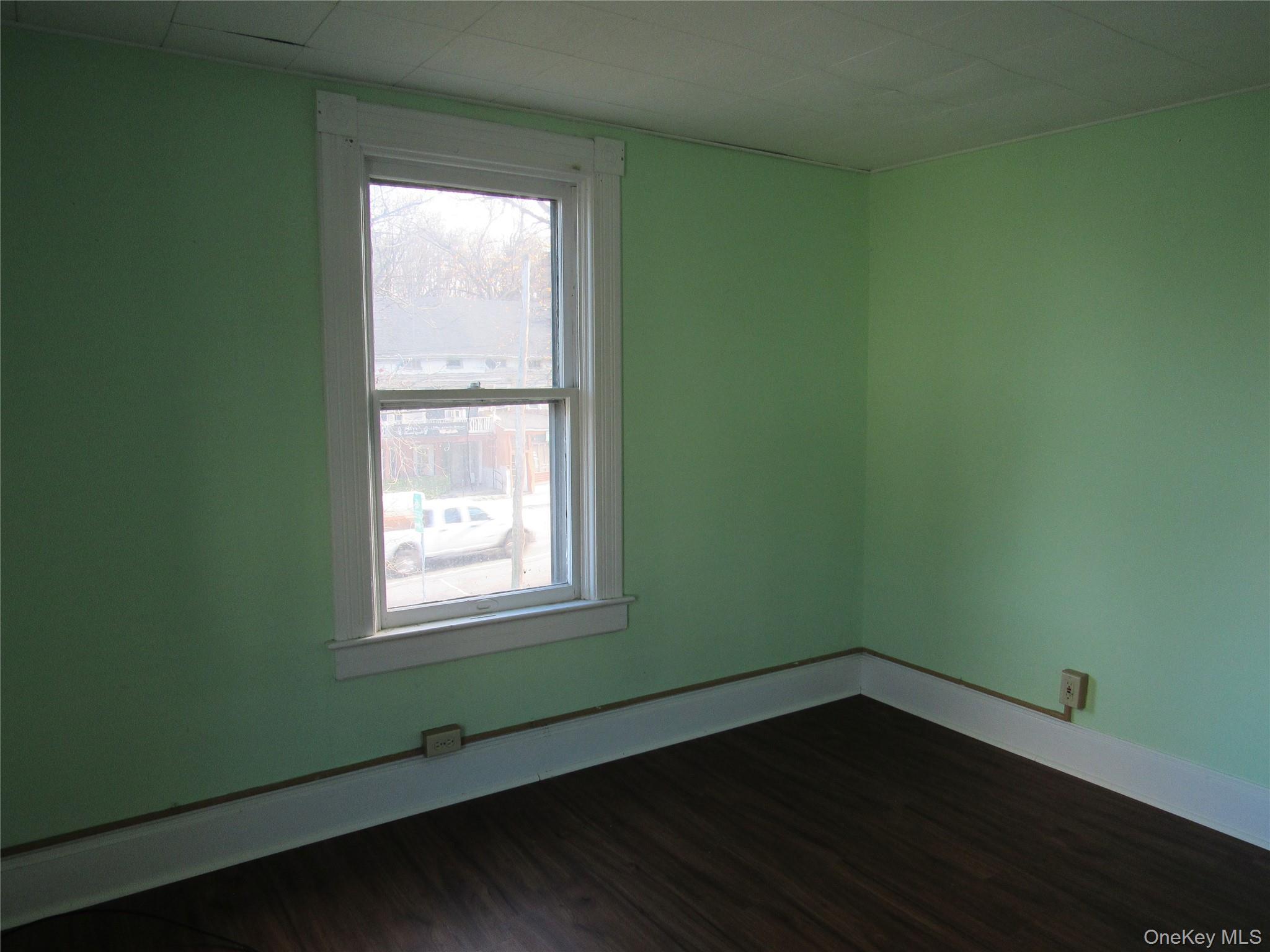 98 Main Street Chester, NY 10918 - Photo 21 of 32 Bedroom #2 featuring dark wood-style floors and baseboards