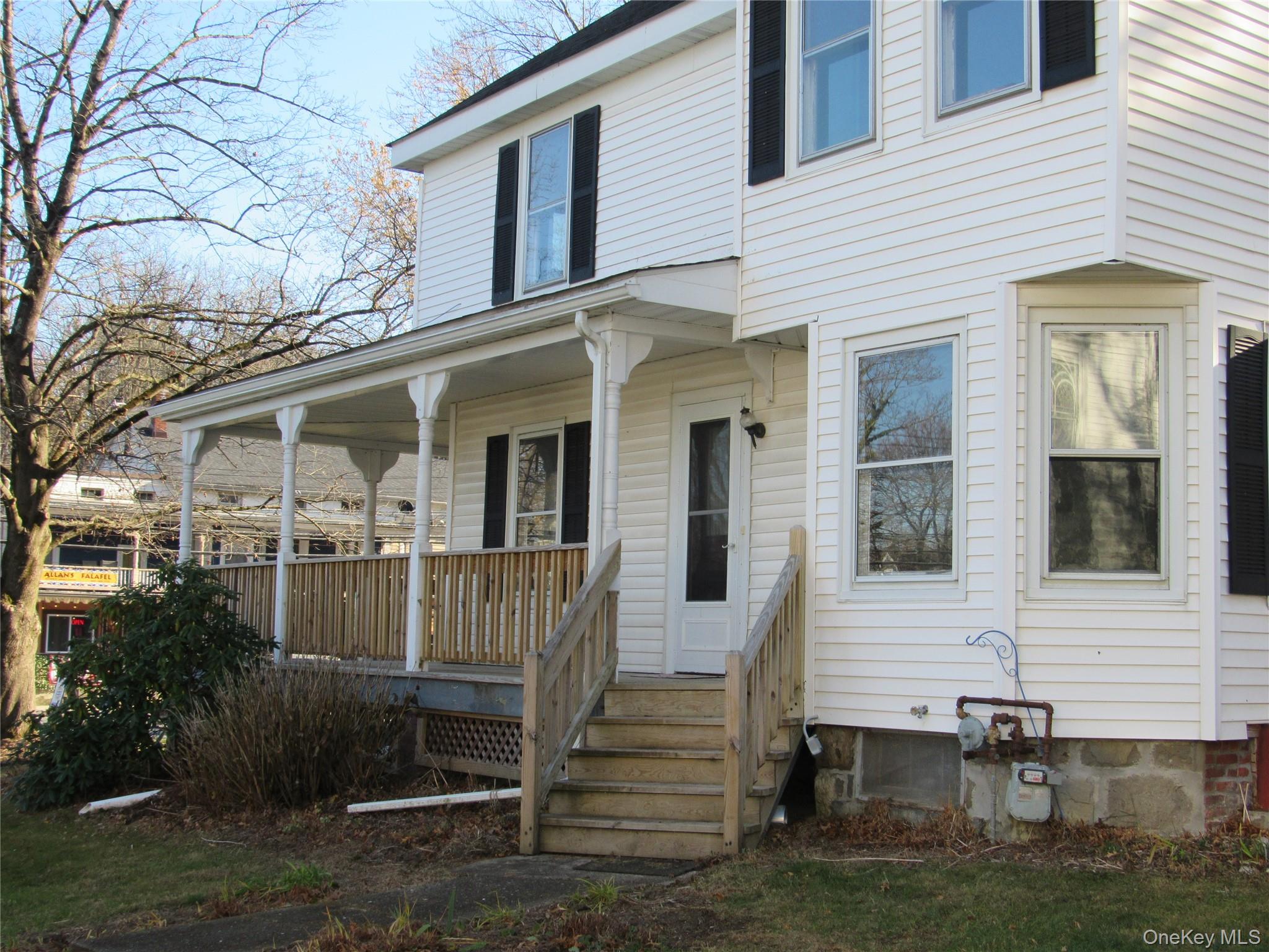 98 Main Street Chester, NY 10918 - Photo 29 of 32 Entrance to property with covered porch- Lockbox on this door