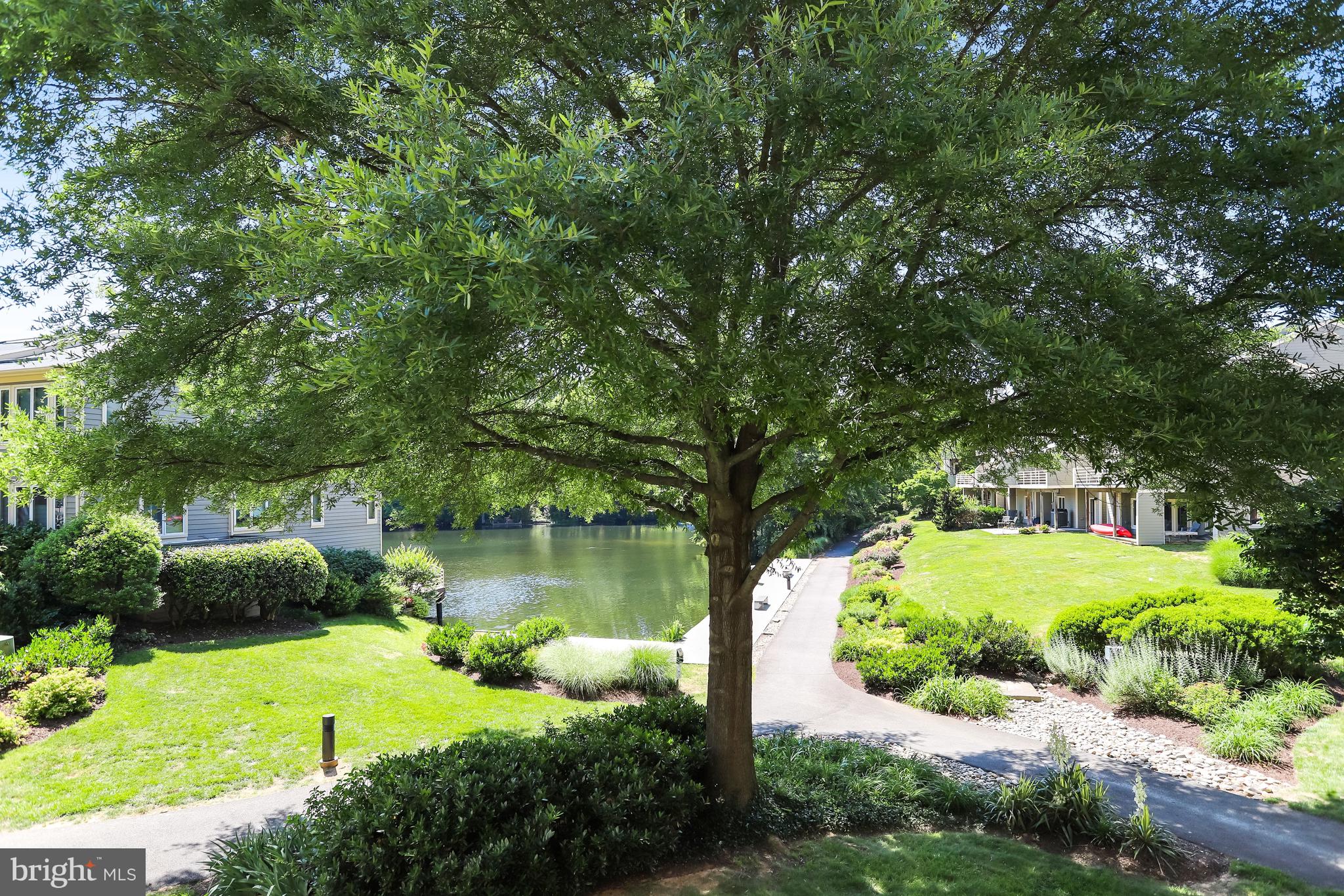 1953 Lakeport Way Reston, VA 20191 - Photo 51 of 60 a view of a lake with a house in background