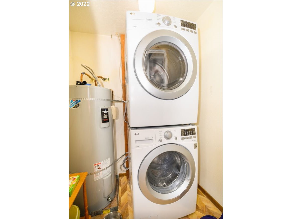 70406 East Terrace Drive Rhododendron, OR 97049 - Photo 21 of 32 a utility room with dryer and washer